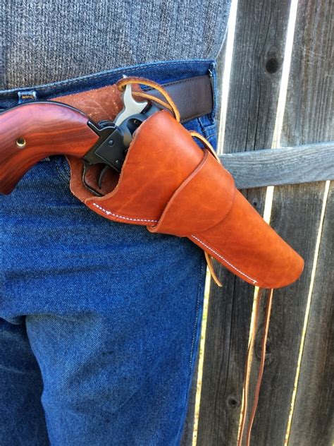 This allows for easy access to your firearm, especially when seated or in a confined space. . Heritage rough rider cross draw holster